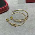 CARTIER JUSTE LARGE HOOP EARRINGS