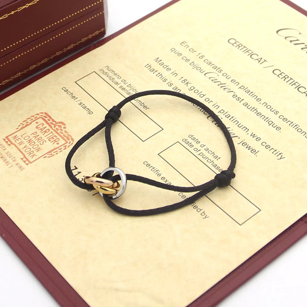 CARTIER TRINITY PINK GOLD SILVER GOLD TEXTILE BRACELET