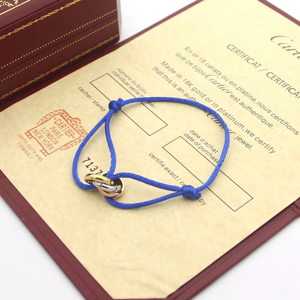 CARTIER TRINITY PINK GOLD SILVER GOLD TEXTILE BRACELET